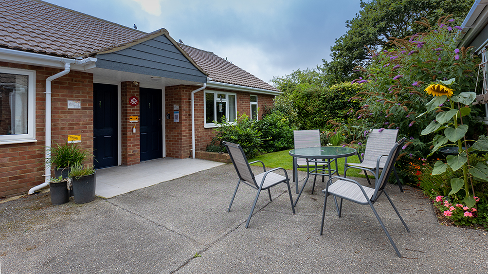 The level entrance and front garden of Bench Cottage